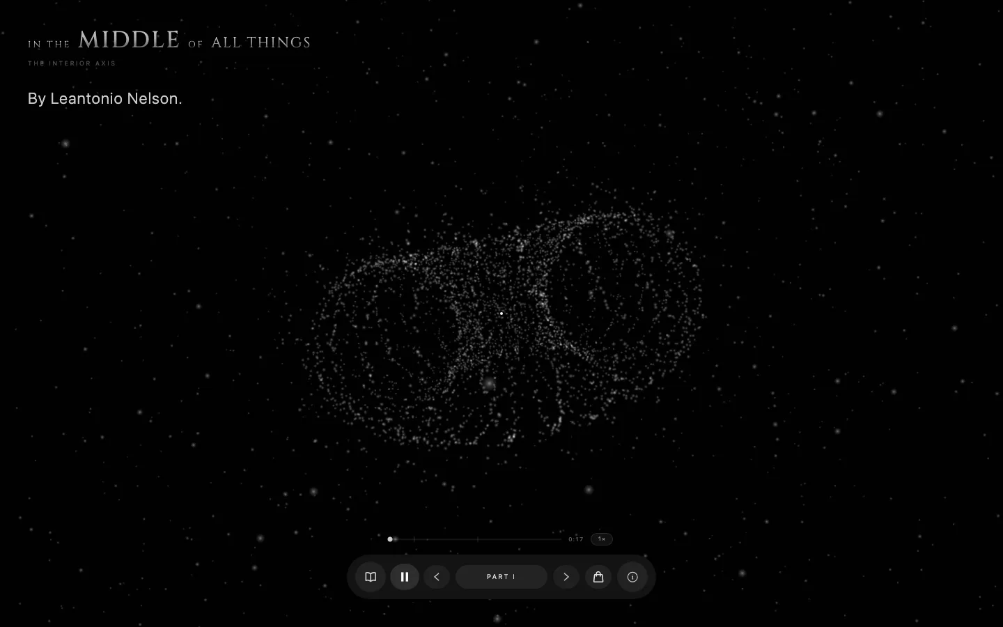 On desktop: particles forming a torus under the author line